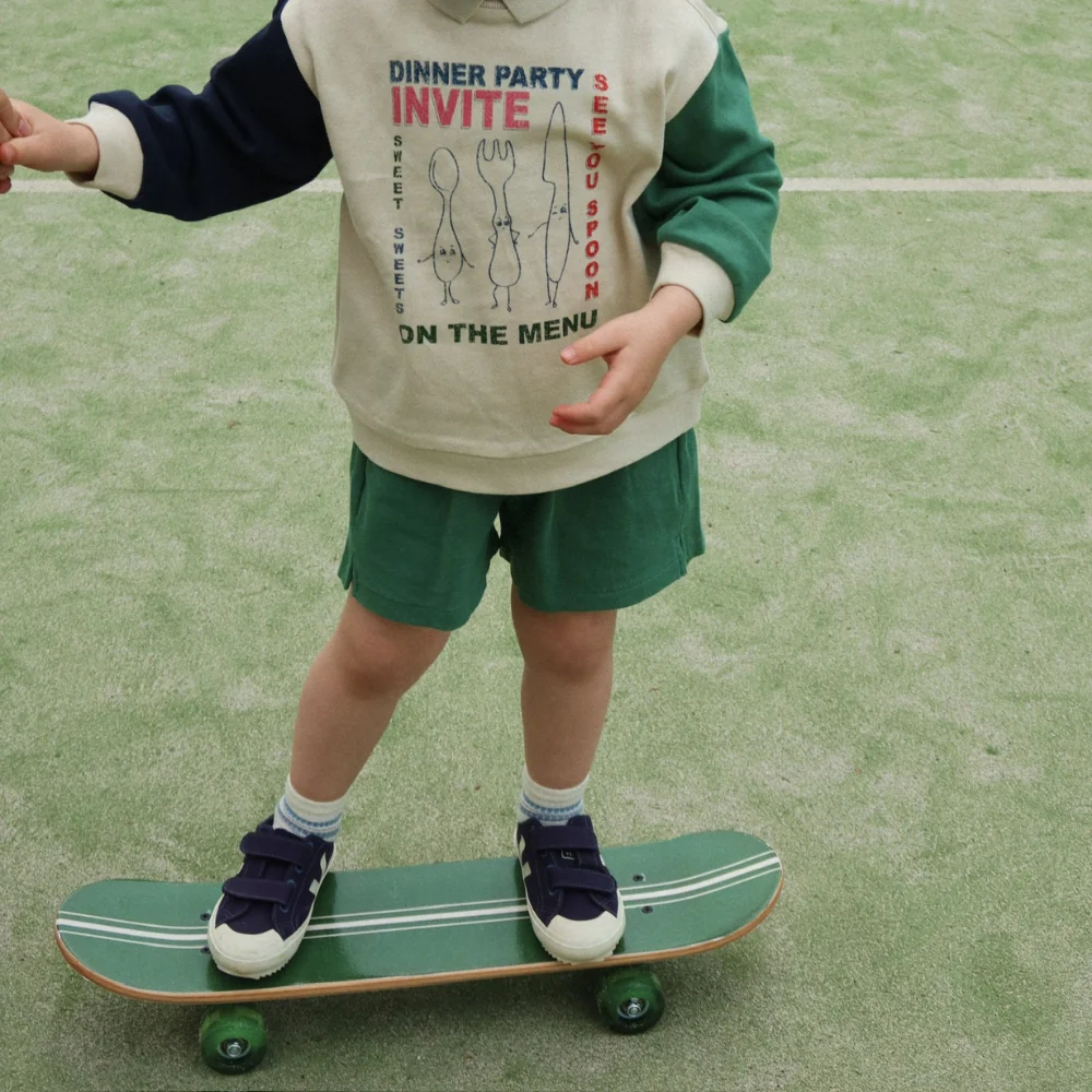 Konges Slojd Skateboard pentru copii cu roți strălucitoare Cattitude