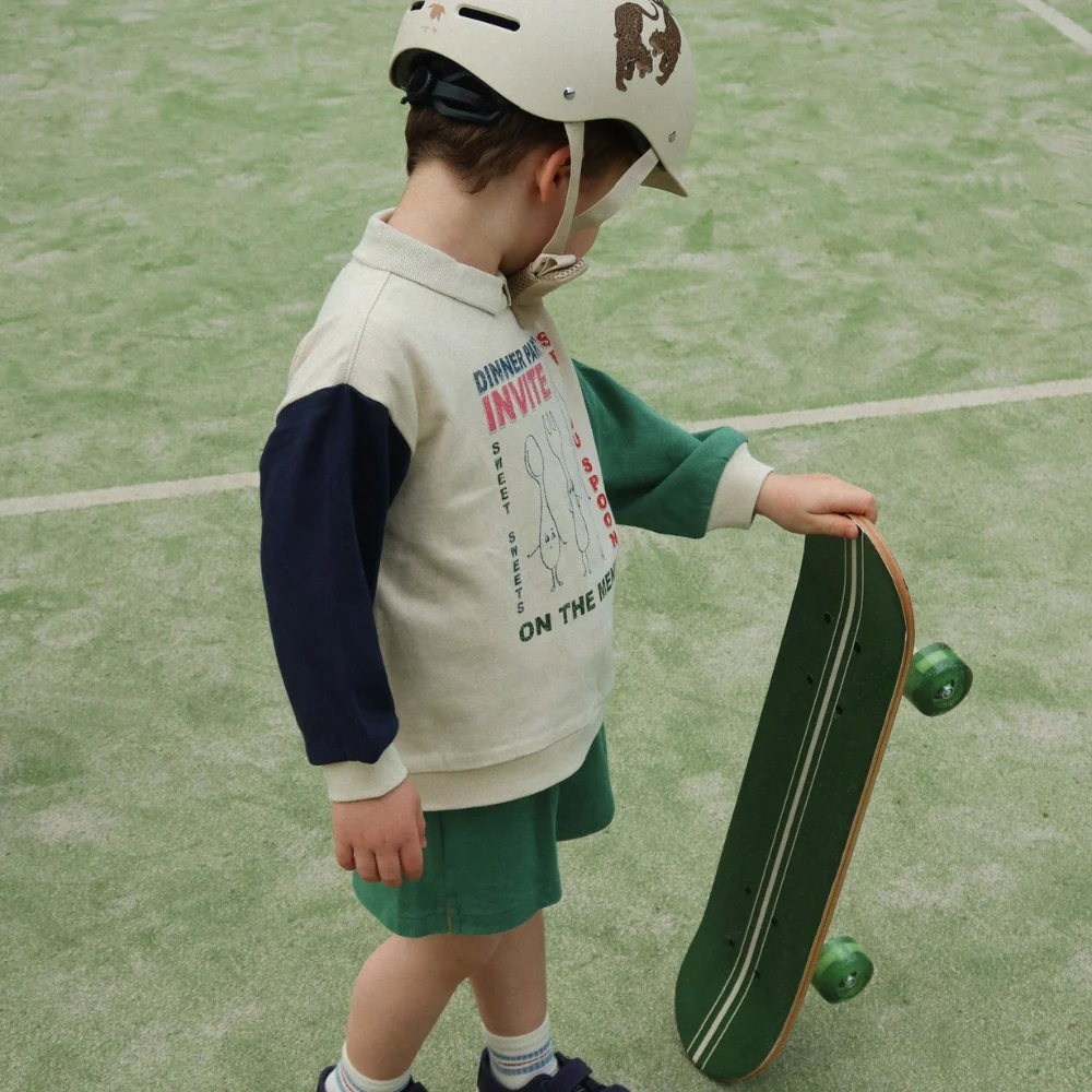Konges Slojd Skateboard pentru copii cu roți strălucitoare Cattitude